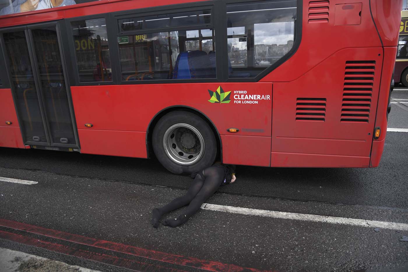 A woman lies injured after a shotting incident on Westminster Bridge in London, March 22, 2017. REUTERS/Toby Melville