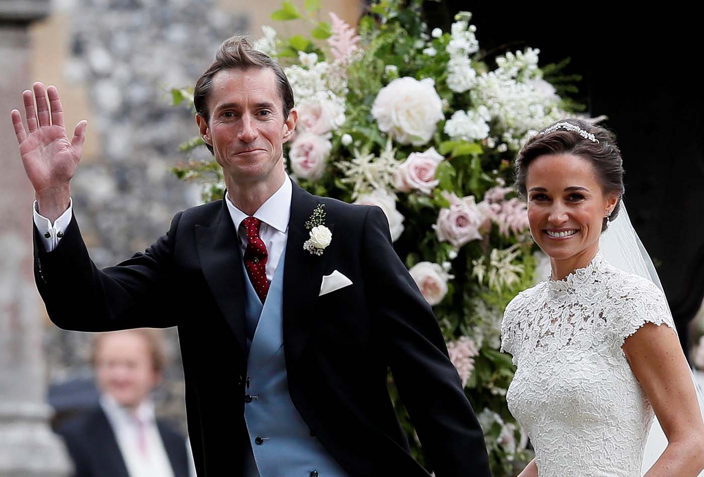 Pippa Middleton and her new husband James Matthews smile following their wedding ceremony at St Mark's Church in Englefield, west of London, on May 20, 2017. REUTERS/Kirsty Wigglesworth/Pool