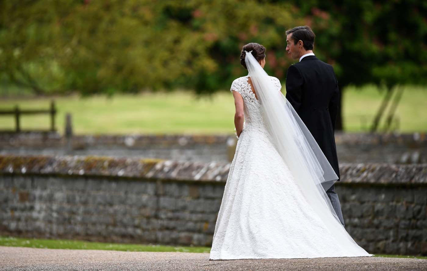 Pippa Middleton and her new husband James Matthews leave following their wedding ceremony at St Mark's Church in Englefield, west of London, on May 20, 2017. REUTERS/Kirsty Wigglesworth/Pool