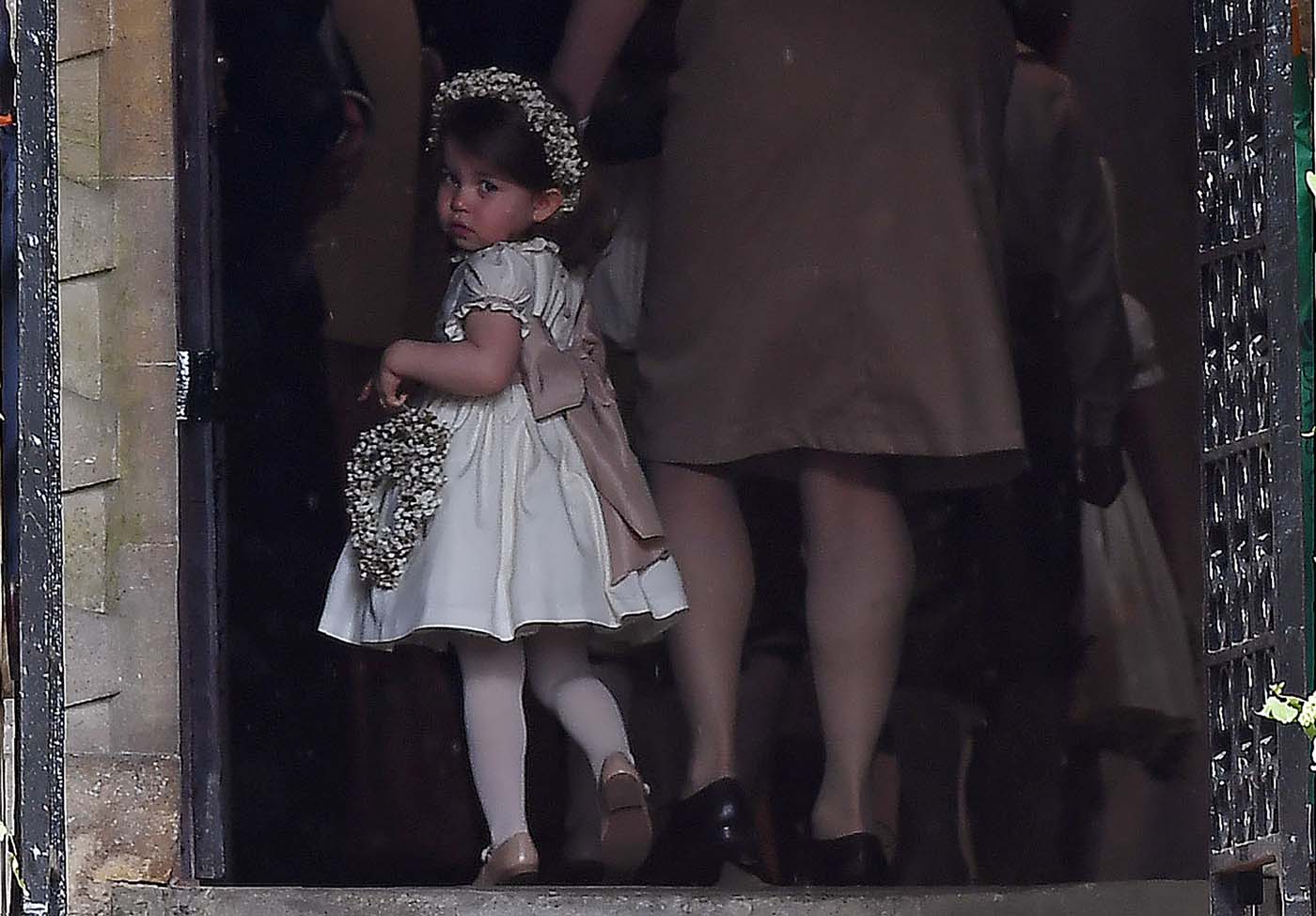 Britain's Princess Charlotte, a bridesmaid, attends the wedding of her aunt Pippa Middleton to James Matthews at St Mark's Church in Englefield, west of London, on May 20, 2017. REUTERS/Justin Tallis/Pool