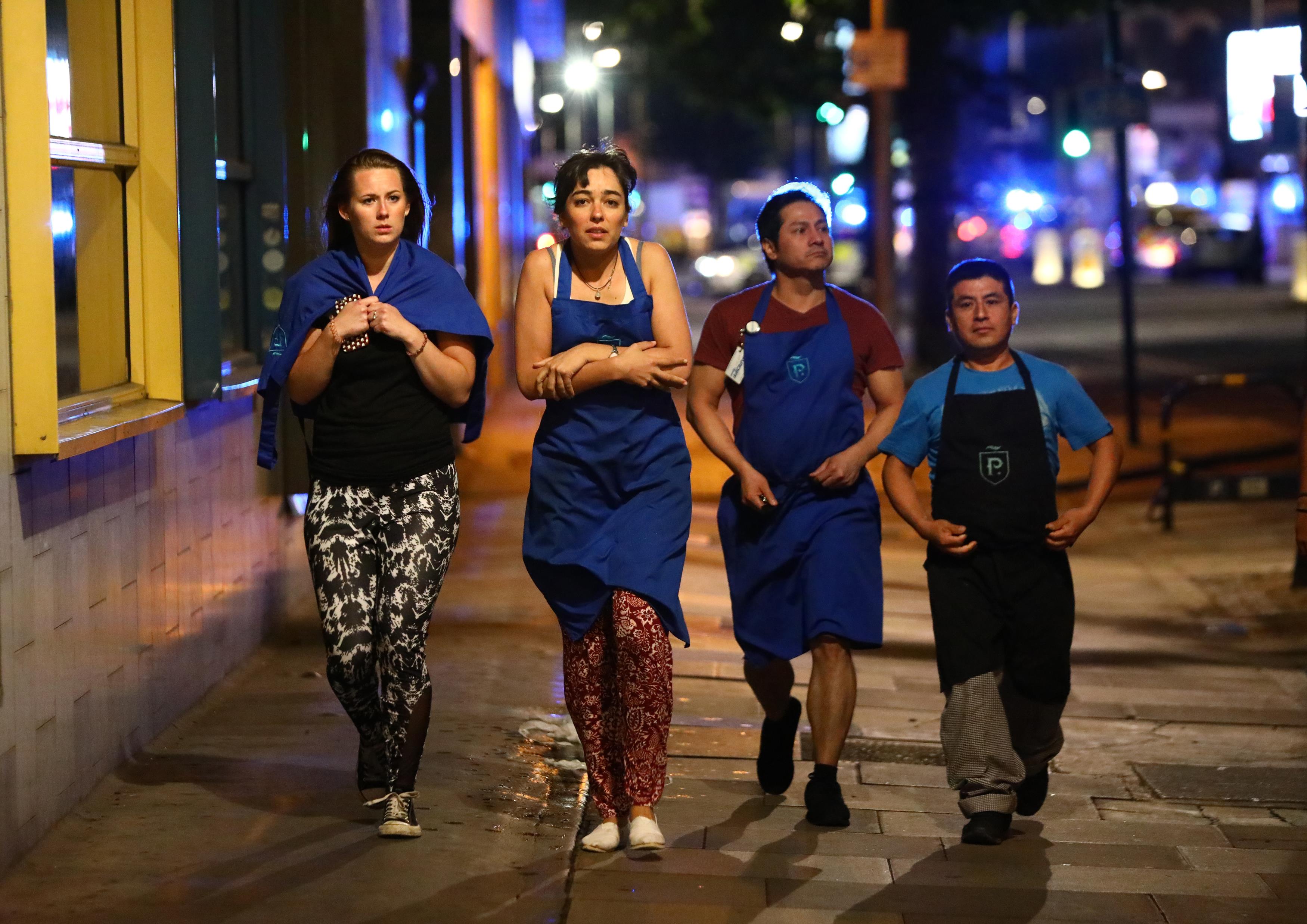 People leave the area after an incident near London Bridge in London, Britain June 4, 2017 REUTERS/Neil Hall