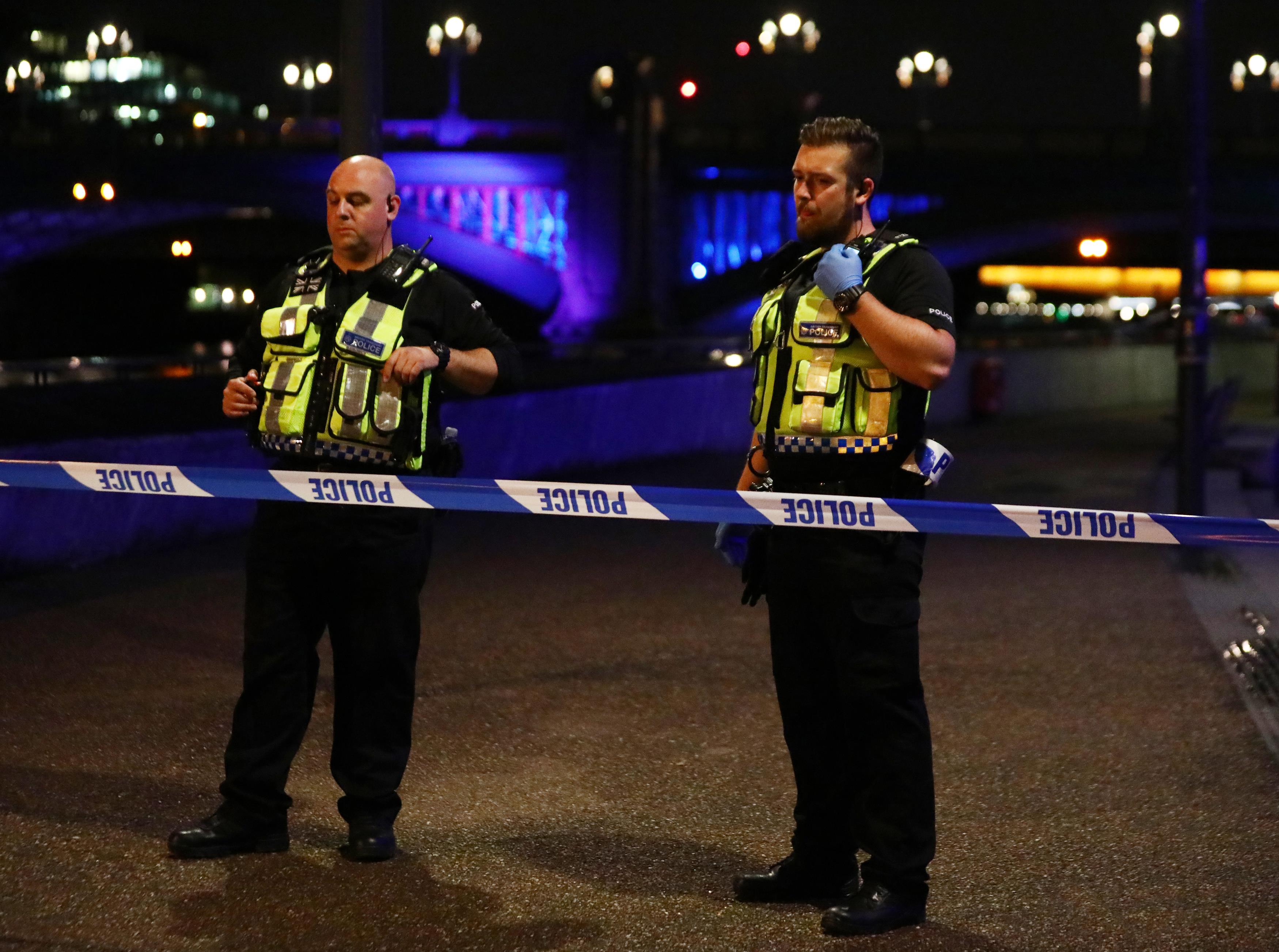 Police officers guard a cordon after an incident near London Bridge in London, Britain June 4, 2017. REUTERS/Neil Hall