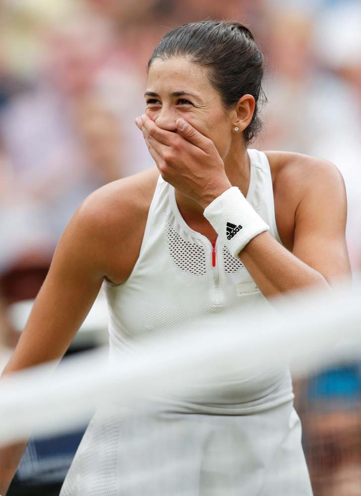 Tennis - Wimbledon - London, Britain - July 15, 2017 Spain’s Garbine Muguruza celebrates winning the final against Venus Williams of the U.S. REUTERS/Matthew Childs