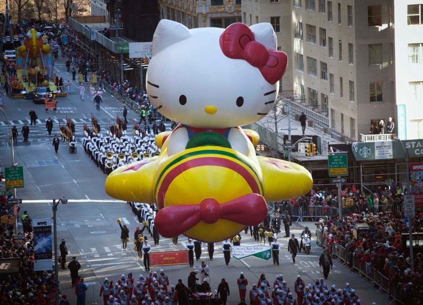 The Hello Kitty balloon float makes its way down 6th Avenue during the