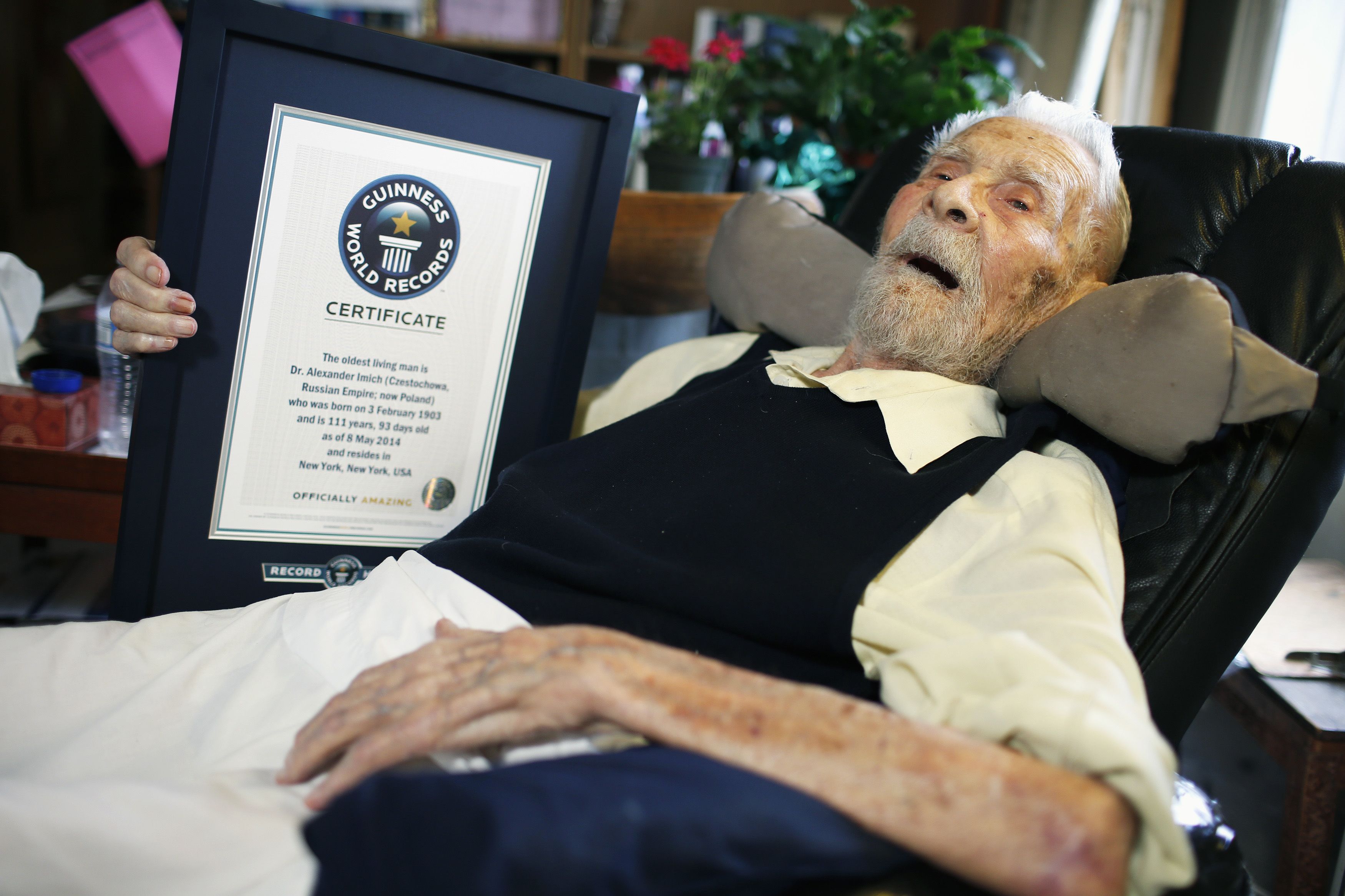 111 Year Old Alexander Imich Holds Guinness World Records Certificate