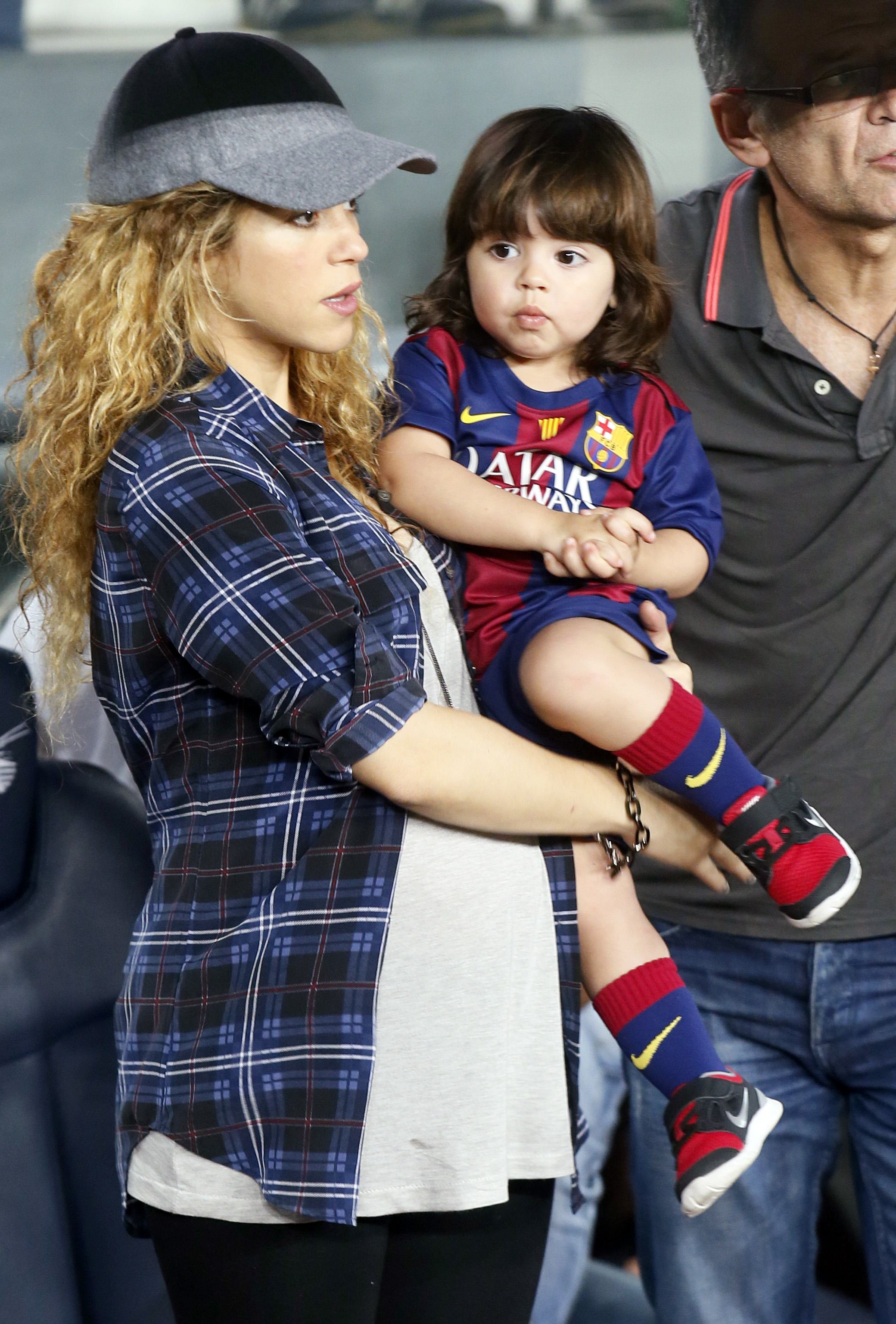 Singer Shakira holds her son Milan before the Spanish first division