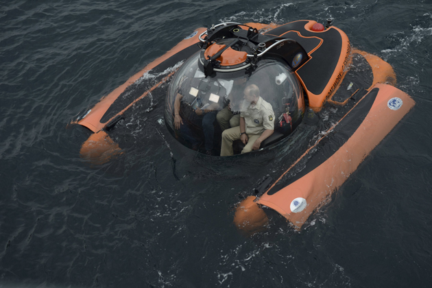 Russian President Vladimir Putin (R) is seen inside a research bathyscaphe while submerging into the waters of the Black Sea as he takes part in an expedition near Sevastopol, Crimea, August 18, 2015. REUTERS/Alexei Nikolsky/RIA Novosti/Kremlin   TPX IMAGES OF THE DAY   ATTENTION EDITORS - THIS IMAGE HAS BEEN SUPPLIED BY A THIRD PARTY. IT IS DISTRIBUTED, EXACTLY AS RECEIVED BY REUTERS, AS A SERVICE TO CLIENTS.