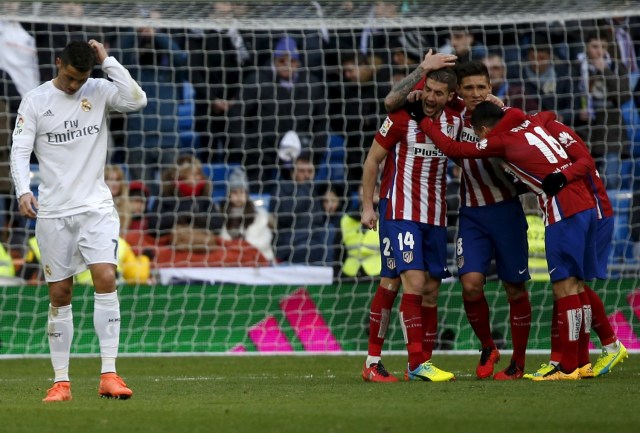 Football Soccer - Real Madrid v Atletico Madrid - Spanish Liga BBVA - Santiago Bernabeu stadium, Madrid, Spain - 27/2/16 Real Madrid's Cristiano Ronaldo reacts at the end of the match. REUTERS/Sergio Perez