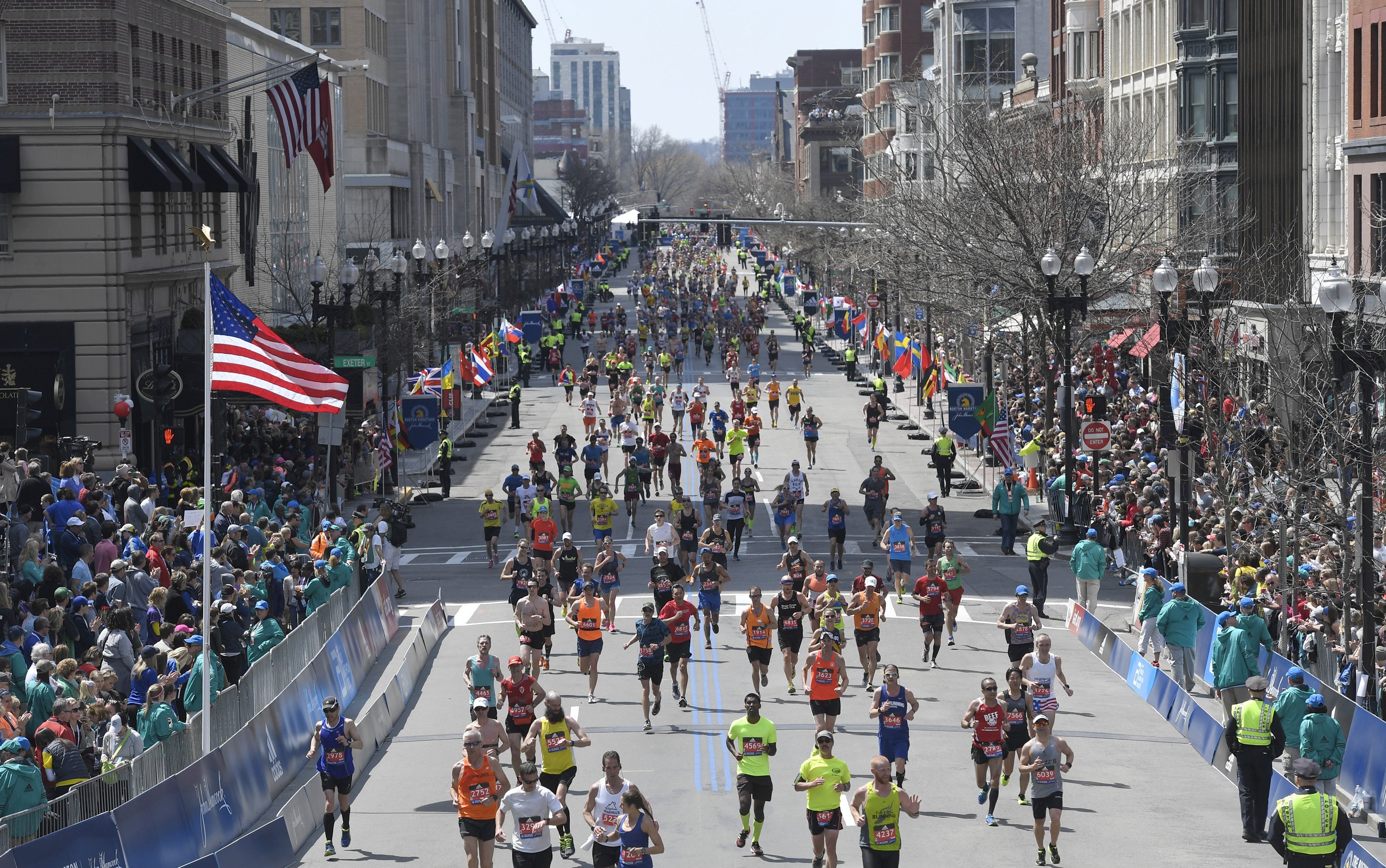 Runners approach the finish line during the 120th running of the Boston