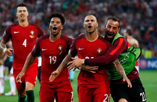 Football Soccer - Poland v Portugal - EURO 2016 - Quarter Final - Stade Velodrome, Marseille, France - 30/6/16 Portugal's Ricardo Quaresma celebrates with team mates after winning the penalty shootout REUTERS/Kai Pfaffenbach Livepic