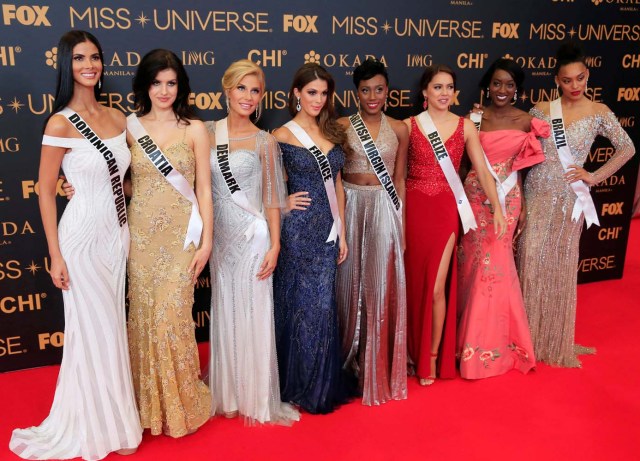 Miss Universe candidates pose for a picture during a red carpet inside a SMX convention in metro Manila, Philippines January 29, 2017. In Photo from L-R: Miss Dominican Republic Rosalba Garcías, Miss Croatia Barbara Filipovic, Miss Denmark Christina Mikkelsen, Miss France Iris Mittenaere, Miss British Virgin Islands Erika Creque, Miss Belize Rebecca Rath, Miss Angola Luísa Baptista and Miss Brazil Raissa Santana. REUTERS/Romeo Ranoco