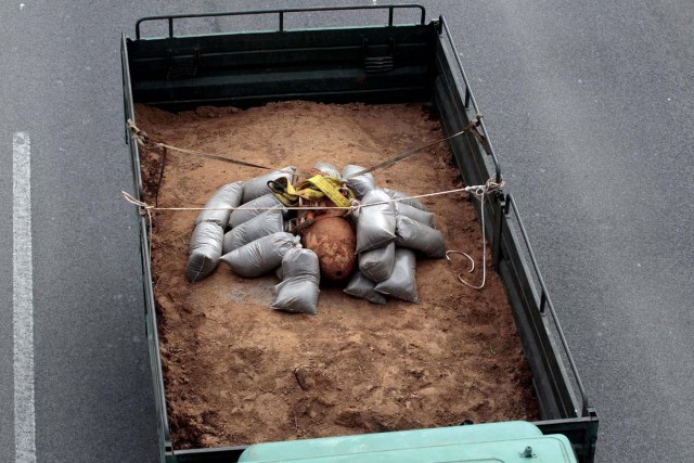 A 250 kg World War Two bomb that was found during excavation works at a gas station, is carried on a military truck, following an operation to defuse it, in the northern city of Thessaloniki, Greece, February 12, 2017. REUTERS/Alexandros Avramidis TPX IMAGES OF THE DAY