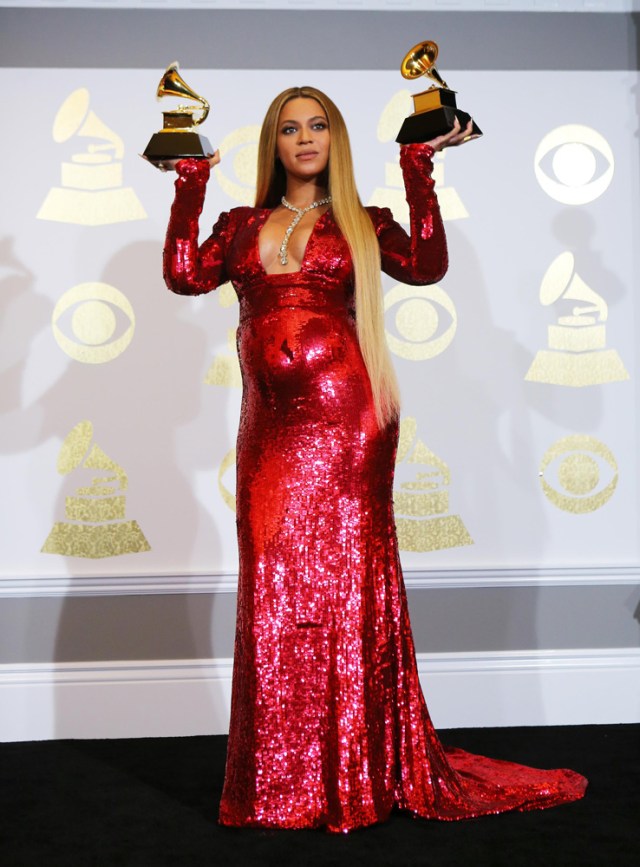 Beyonce holds the awards she won for Best Urban Contemporary Album for "Lemonade" and Best Music Video for "Formation" at the 59th Annual Grammy Awards in Los Angeles, California, U.S. , February 12, 2017. REUTERS/Mike Blake