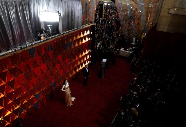 89th Academy Awards - Oscars Red Carpet Arrivals - Hollywood, California, U.S. - 26/02/17 - Dakota Johnson (L) poses as she arrives. REUTERS/Mario Anzuoni