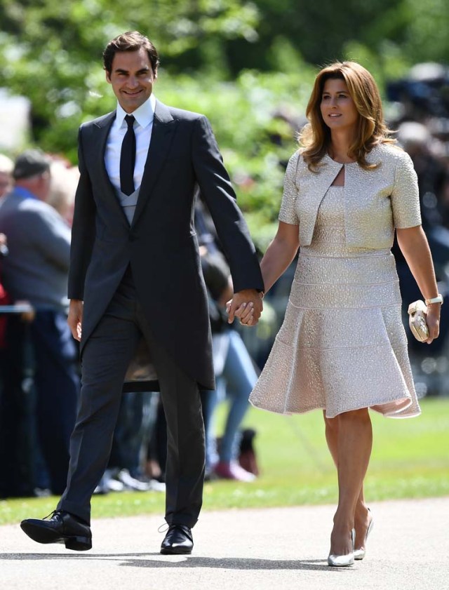 Swiss tennis player Roger Federer and his wife Mirka attend the wedding of Pippa Middleton, the sister of Britain's Catherine, Duchess of Cambridge, and James Matthews at St Mark's Church in Englefield, west of London, on May 20, 2017. REUTERS/Justin Tallis/Pool
