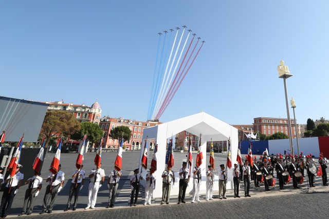 The Patrouille Acrobatique de France perform during a commemorative ceremony marking the first anniversary of a jihadist truck attack which killed 86 people in Nice, southern France, on Bastille Day, July 14, 2017. Bastille Day celebrations were tinged with mourning, as the Mediterranean city of Nice payed tribute to the victims of an attack claimed by the Islamic State group one year ago, where a man drove a truck into a crowd, killing 86 people.   / AFP PHOTO / Valery HACHE
