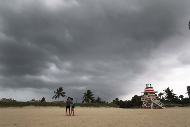 MIAMI BEACH, FL - SEPTEMBER 09: Storm clouds are seen over the beach as Hurricane Irma approaches on September 9, 2017 in Miami Beach, Florida. Florida is in the path of the Hurricane which may come ashore at category 4.   Joe Raedle/Getty Images/AFP