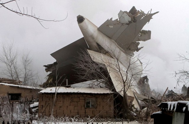 Plane debris is seen at the crash site of a Turkish cargo jet near Kyrgyzstan's Manas airport outside Bishkek, Kyrgyzstan January 16, 2017. REUTERS/Vladimir Pirogov/File Photo      SEARCH "POY GLOBAL" FOR THIS STORY. SEARCH "REUTERS POY" FOR ALL BEST OF 2017 PACKAGES.    TPX IMAGES OF THE DAY