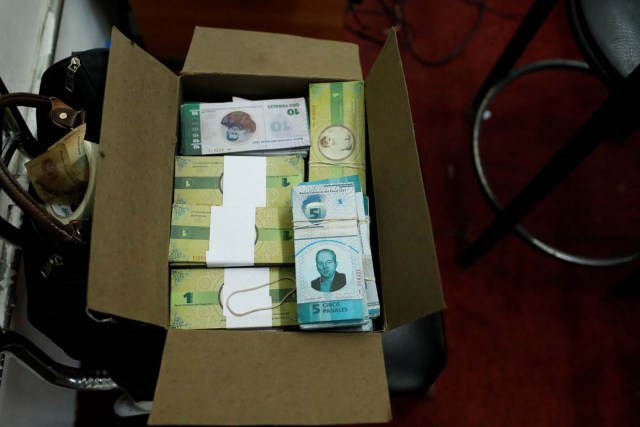 Stacks of Panal notes are seen in a box at a branch of BanPanal communal bank in Caracas, Venezuela December 15, 2017. REUTERS/Marco Bello