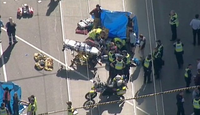 ATTENTION EDITORS - VISUAL COVERAGE OF SCENES OF INJURY OR DEATH Police and emergency services attend to the scene of an incident involving a vehicle on Flinders Street, as seen from Swanson Street, in Melbourne, Australia December 21, 2017. NINE NETWORK/Reuters TV via REUTERS ATTENTION EDITORS - THIS IMAGE WAS PROVIDED BY A THIRD PARTY. NO RESALES. NO ARCHIVE. AUSTRALIA OUT. NEW ZEALAND OUT. PAPUA NEW GUINEA OUT.