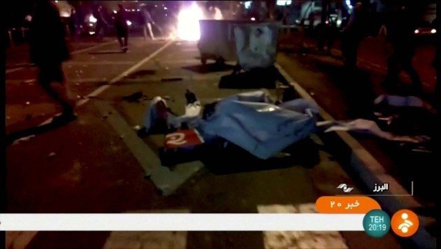 REFILE - CORRECTING LOCATION   Debris is seen during a protest in Alborz Province, Iran, in this still image taken from video on December 31, 2017. IRINN/ReutersTV via REUTERS ATTENTION EDITORS - THIS IMAGE WAS PROVIDED BY A THIRD PARTY. IRAN OUT. NO RESALES. NO ARCHIVE. NO ACCESS BBC PERSIAN, NO ACCESS MANOTO, NO ACCESS VOA PERSIAN.