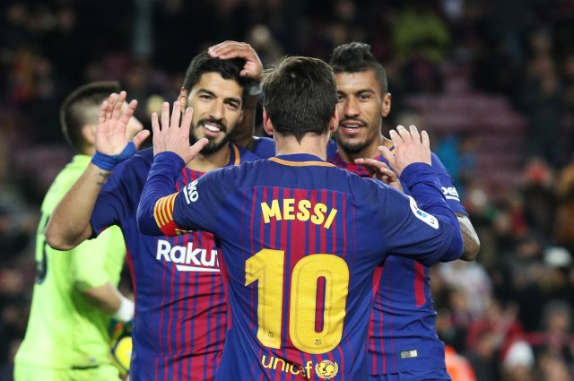 Soccer Football - La Liga Santander - Barcelona vs Levante - Camp Nou, Barcelona, Spain - January 7, 2018 Barcelona's Paulinho celebrates scoring their third goal with Lionel Messi and Luis Suarez REUTERS/Albert Gea