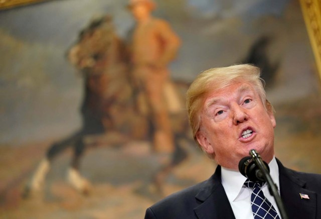 U.S. President Donald Trump speaks before signing a proclamation to honor Martin Luther King Jr. day in the Roosevelt Room of the White House in Washington, U.S., January 12, 2018.   REUTERS/Joshua Roberts