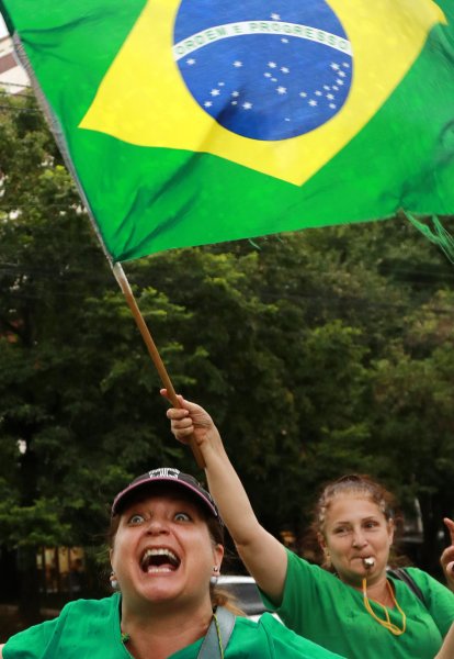Women celebrate after a Brazilian appeals court upheld the corruption conviction of former President Luiz Inacio Lula da Silva, in Porto Alegre, Brazil January 24, 2018. REUTERS/Diego Vara