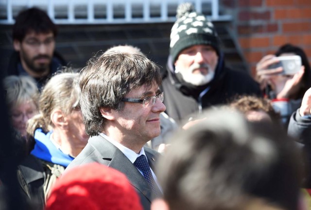 Catalonia's former leader Carles Puigdemont looks on as he leaves the prison in Neumuenster, Germany, April 6, 2018. A German court on Thursday rejected an extradition request for Puigdemont on the charge of rebellion for his role in the campaign for the region's independence. REUTERS/Fabian Bimmer