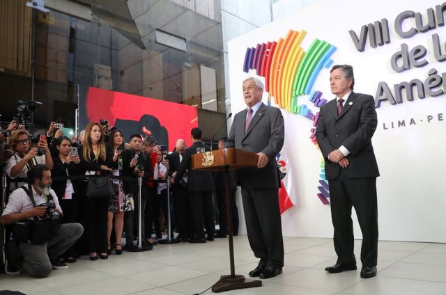 Chile's President Sebastian Pinera accompanied by his Foreign Minister Roberto Ampuero attends a press conference at the VIII Summit of the Americas in Lima, Peru April 14, 2018. REUTERS/ Guadalupe Pardo