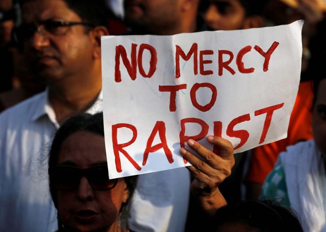 People participate in a protest against the rape of an eight-year-old girl in Kathua near Jammu, and a teenager in Unnao, Uttar Pradesh state, in Mumbai, India, April 15, 2018. REUTERS/Danish Siddiqui