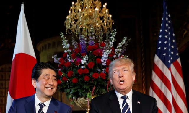 U.S. President Donald Trump meets with Japanese Prime Minister Shinzo Abe at his Mar-a-Lago estate in Palm Beach, Florida U.S. April 17, 2018. REUTERS/Kevin Lamarque