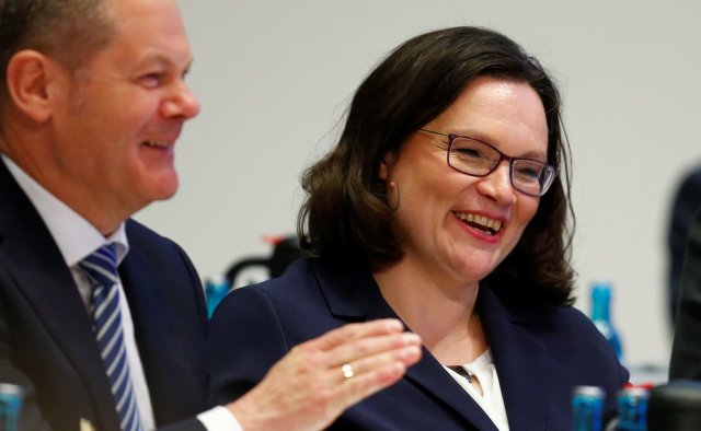 German Finance Minister Olaf Scholz applaudes for new elected SPD leader Andrea Nahles during a one-day party congress of the Social Democratic Party (SPD) in Wiesbaden, Germany, April 22, 2018. REUTERS/Ralph Orlowski