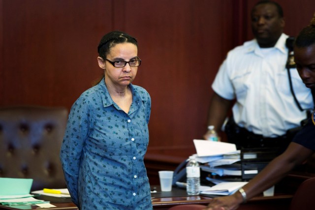 FILE PHOTO:  Yoselyn Ortega, a nanny who is accused of killing Lucia and Leo Krim, ages 6 and 2 respectively, arrives for a hearing for her trial at Manhattan Supreme Court in New York, July 8, 2013.  REUTERS/Lucas Jackson/File Photo