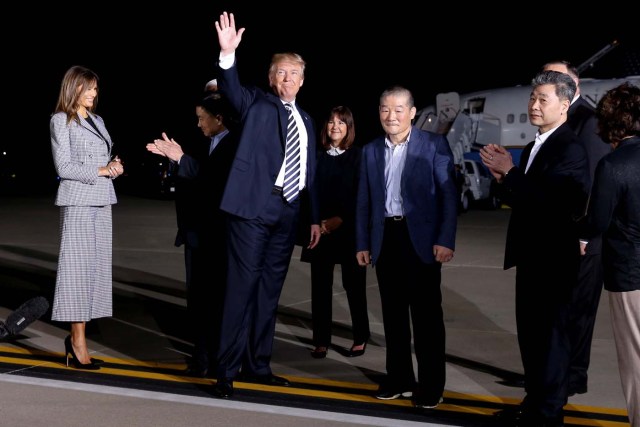 U.S.President Donald Trump waves after speaking to the media as he meets the three Americans released from detention in North Korea upon their arrival at Joint Base Andrews, Maryland, U.S. May 10, 2018. REUTERS/Jonathan Ernst